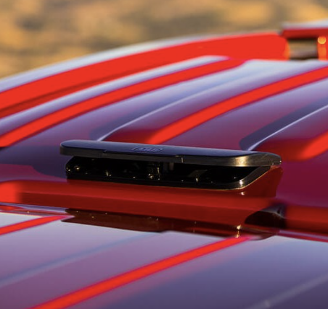 High-flow truck cap vent feature