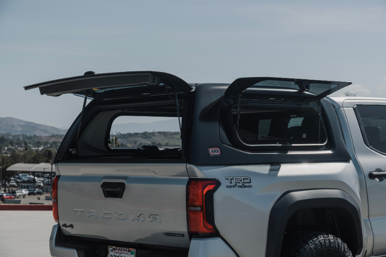 ARB Ascent truck cap on a Toyota Tacoma with the doors open